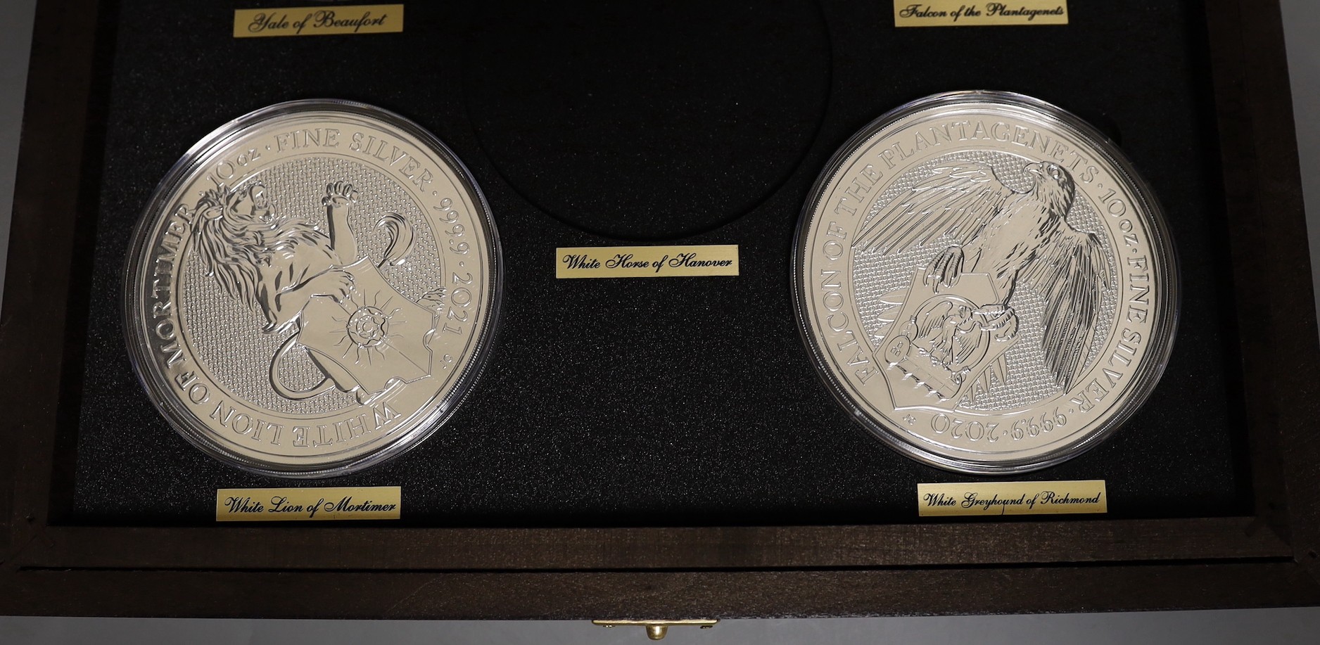 A cased part set of nine Queen's Beasts 10oz. bullion silver £10 coins, BU